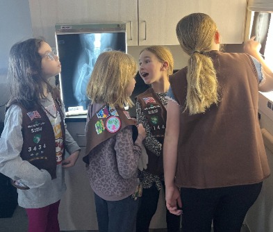 young girls looking at xray