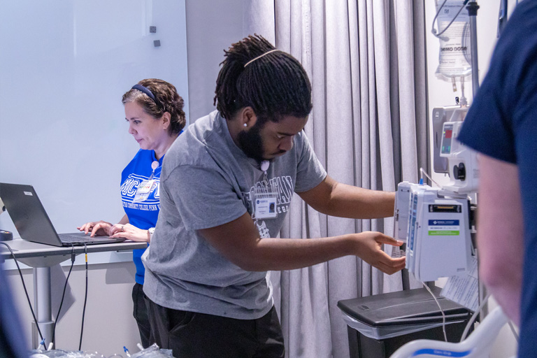 Student working with Respiratory Care program lab equipment